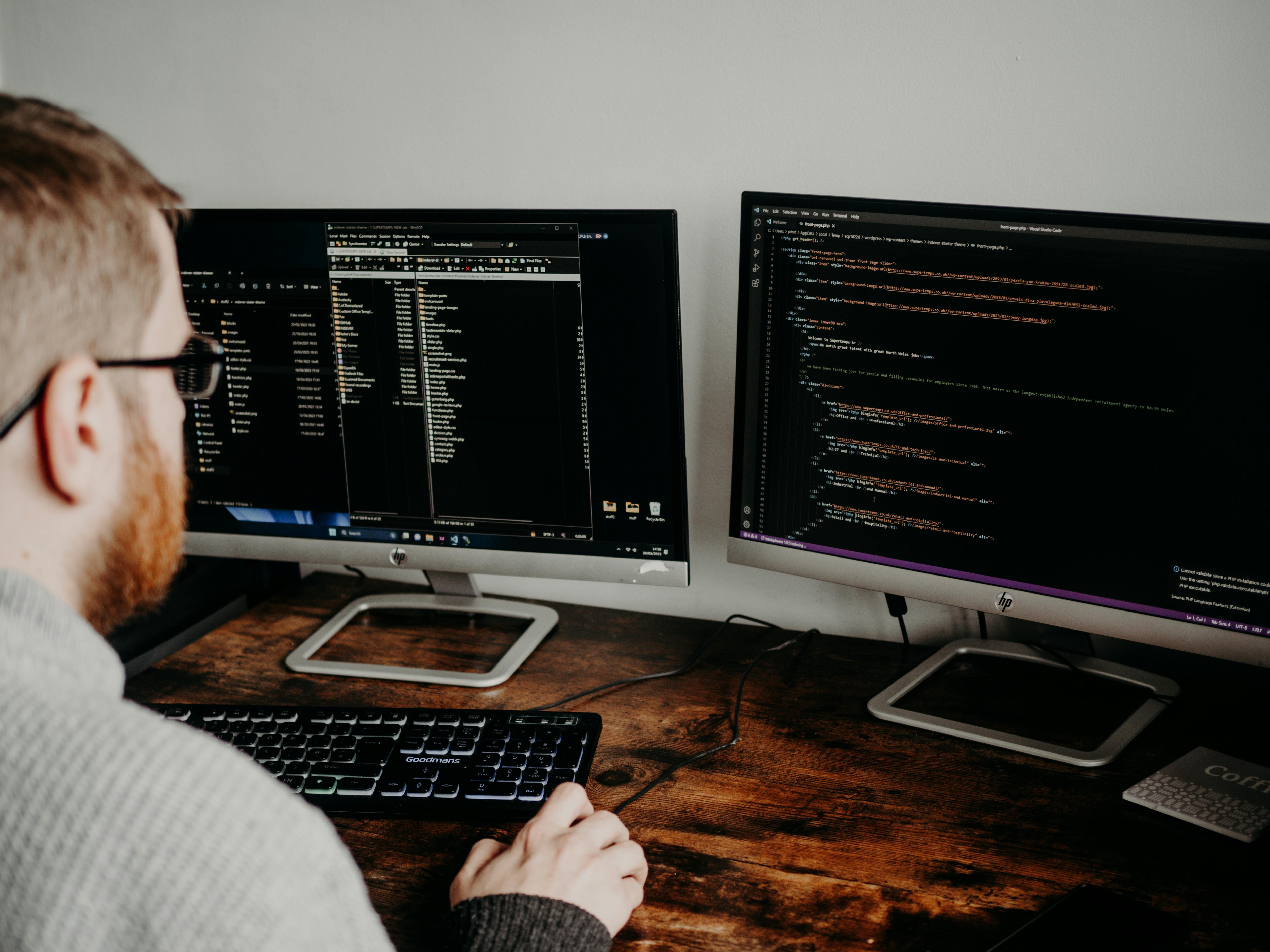 Workspace with code on multiple monitors